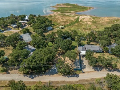 Explore this breathtaking waterfront lot on Hubbard Creek Lake - photo 16