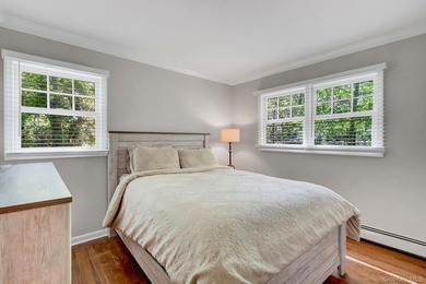 Tucked on a sprawling .57-acre canvas of park-like grounds, this - photo 19