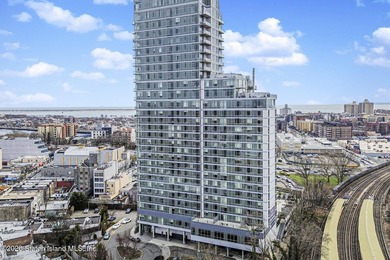 Unit 21B is a one-bedroom, one-bathroom, north-facing unit with - photo 2