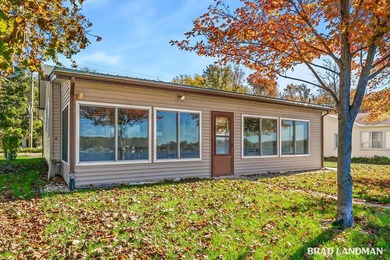 Lovingly cared for Gun Lake cottage on Robbins Bay, offering - photo 24