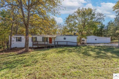 Escape to the peace and tranquility of this charming 3-bedroom - photo 4