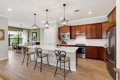 Welcome to Boca Flores, an exceptional 55+ gated, lakefront - photo 11