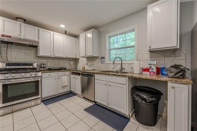 Fully operational and 100% occupied, this 13-bedroom adult - photo 13