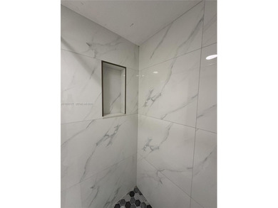 Completely remodeled 2-bedroom, 2-bathroom condo in the heart of