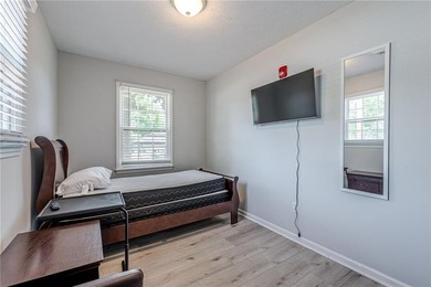 Fully operational and 100% occupied, this 13-bedroom adult - photo 18