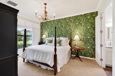 Welcome to Boca Flores, an exceptional 55+ gated, lakefront - photo 24
