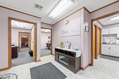 This conveniently located commercial building is just off Hwy 90