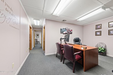 This conveniently located commercial building is just off Hwy 90