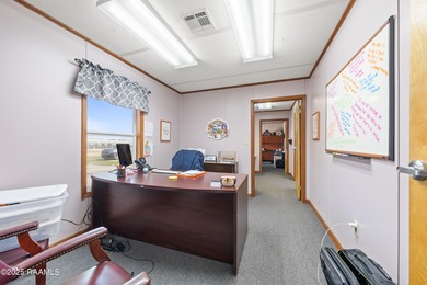 This conveniently located commercial building is just off Hwy 90