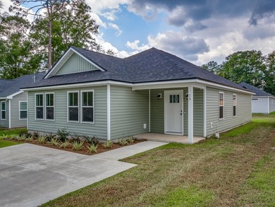 Affordable 4 bedroom brand new construction! Generous $7500 from - photo 2