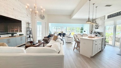 This stunningly renovated home offers modern luxury and peace of - photo 5