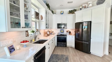 This stunningly renovated home offers modern luxury and peace of - photo 9
