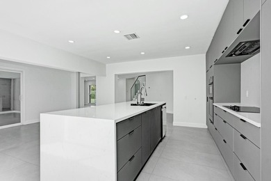 New roof, updated electrical and plumbing, a gourmet kitchen - photo 9