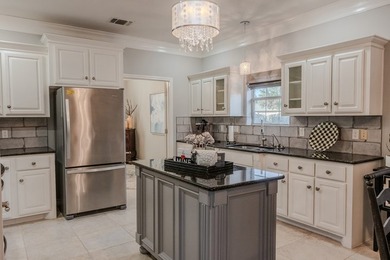 This spectacular brick home has style & comfort! Granite - photo 11