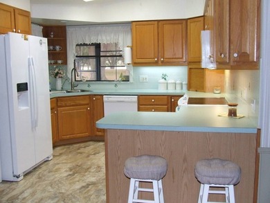 LARGE GREEN SPACE FACING THE WATER FROM A LARGE FLORIDA ROOM - photo 32