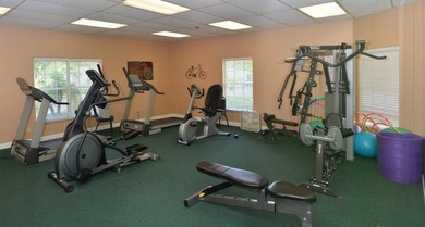 LARGE GREEN SPACE FACING THE WATER FROM A LARGE FLORIDA ROOM - photo 36