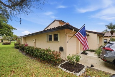Discover this two-bedroom, two-bath end unit in Quail Meadows at - photo 2