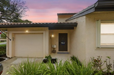 Discover this two-bedroom, two-bath end unit in Quail Meadows at - photo 3