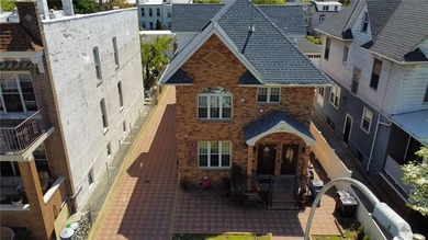 Welcome to 152 68th Street a stunning custom-built two family - photo 4
