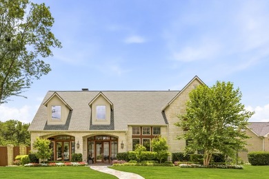 Tucked beneath the mature trees of Bent Tree North, this custom - photo 1