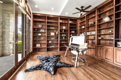 Tucked beneath the mature trees of Bent Tree North, this custom - photo 4