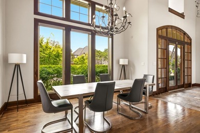 Tucked beneath the mature trees of Bent Tree North, this custom - photo 6