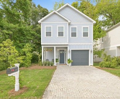 Located in the quiet, brick-paved community of Sacred Oaks. This - photo 1