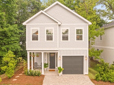 Located in the quiet, brick-paved community of Sacred Oaks. This - photo 2