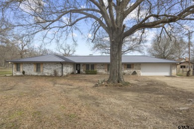 Beautiful brick home in Mt. Pleasant! This 4 bed 2 bath offers - Lake Home For Sale in Mount Pleasant, Texas