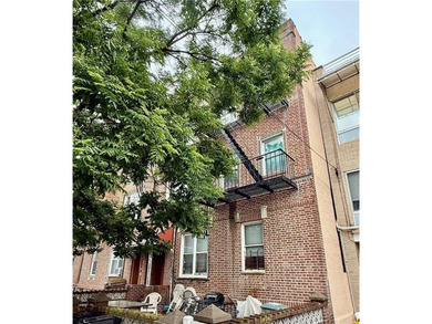 Introducing this well maintained six-family solid brick building - photo 2