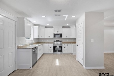 Welcome to this well-maintained 3 bedroom, 2 bath home located - photo 9