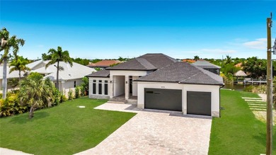BRAND NEW WATERFRONT MASTERPIECE WITH GULF ACCESS. Welcome to - photo 4