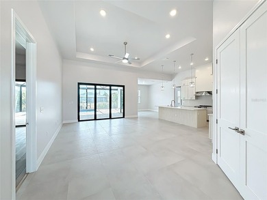 BRAND NEW WATERFRONT MASTERPIECE WITH GULF ACCESS. Welcome to - photo 6