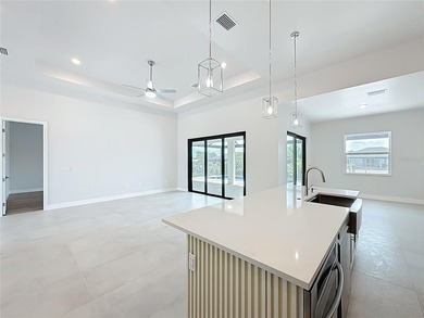 BRAND NEW WATERFRONT MASTERPIECE WITH GULF ACCESS. Welcome to - photo 10