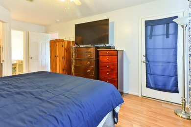 Welcome to 4990 Windsor Green Way, Unit 102, a first-floor condo