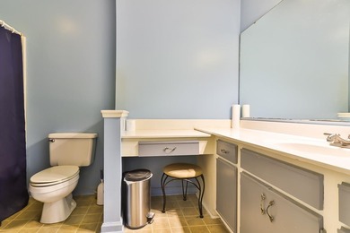 Welcome to 4990 Windsor Green Way, Unit 102, a first-floor condo