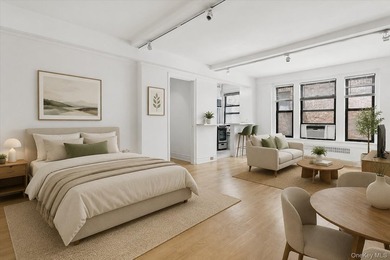 Welcome home to this beautifully renovated studio co-op in the - photo 1