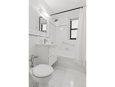 Welcome home to this beautifully renovated studio co-op in the - photo 8