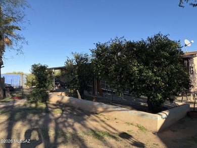 Enjoy peaceful desert living on this beautiful Picture Rocks