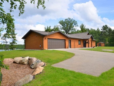 LAKE BELLE TAINE! Rare offering alert on one of the region's - photo 8