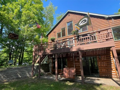 Experience Northwoods lake living at its finest in this - photo 3