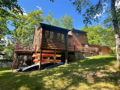 Experience Northwoods lake living at its finest in this - photo 4