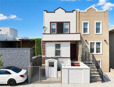 Opportunity awaits with this semi-attached two-family home - photo 2