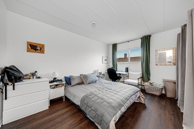 Welcome to this sun-drenched 1-bedroom, 1-bath residence in