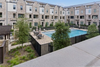 Overlooking the community courtyard and resort-style pool, this - photo 15