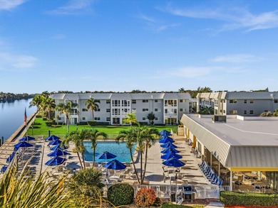 This exceptional two-bedroom, two-bath residence offers refined