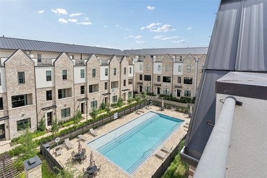 Overlooking the community courtyard and resort-style pool, this - photo 32