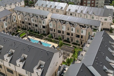 Overlooking the community courtyard and resort-style pool, this - photo 36
