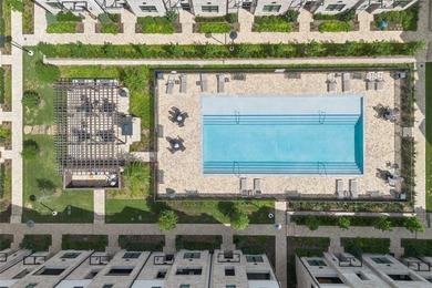 Overlooking the community courtyard and resort-style pool, this - photo 37