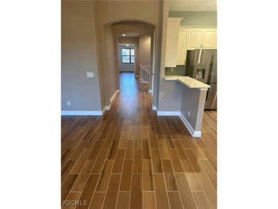 This premier fountain view, private elevator, spacious two-car